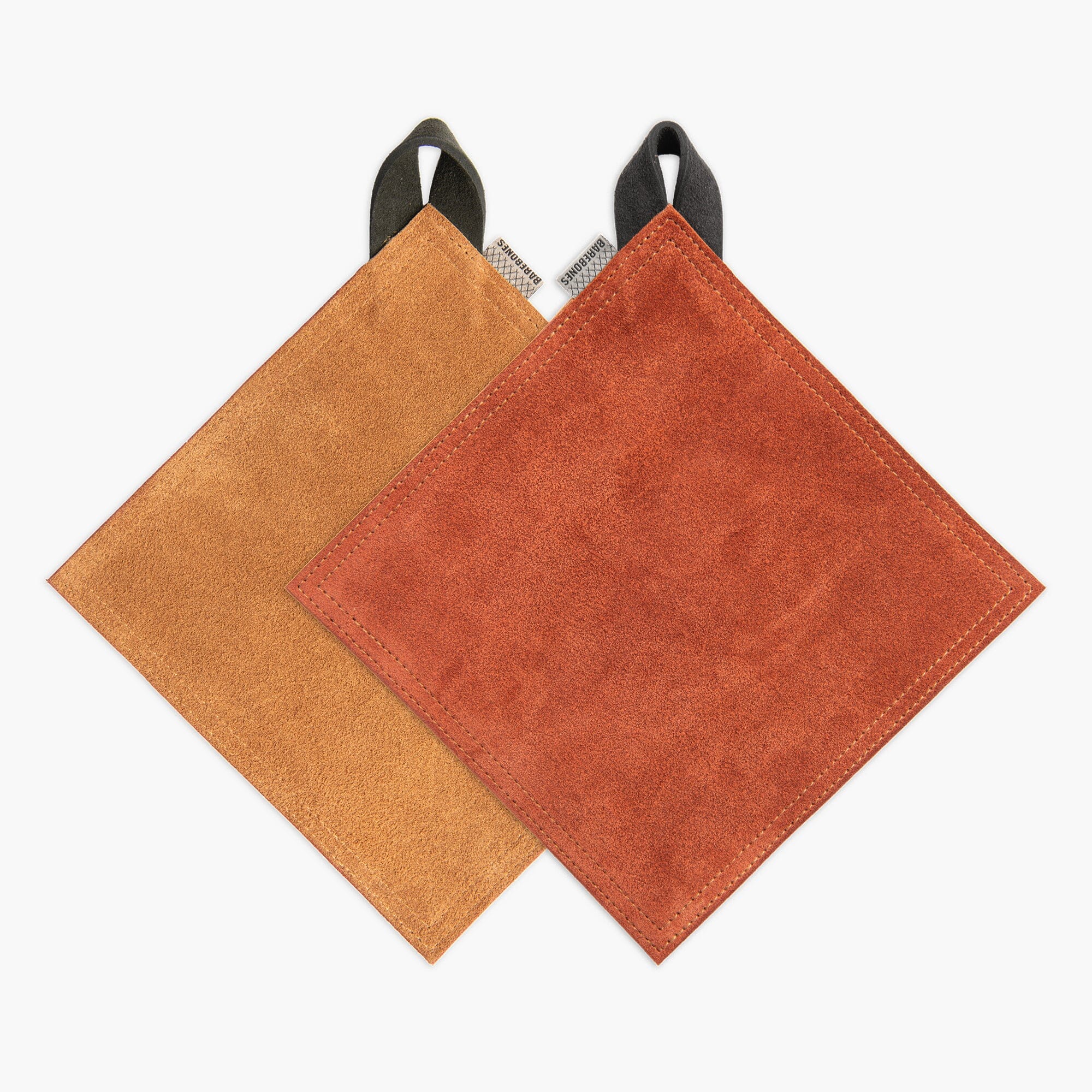 Two suede pot holders, one Tan and one Terracotta, on a white background.